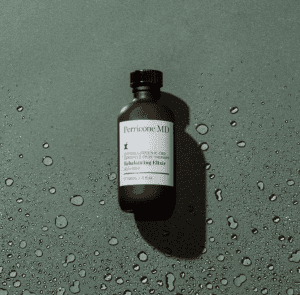 Sensitive therapy bottle on a wet green backdrop