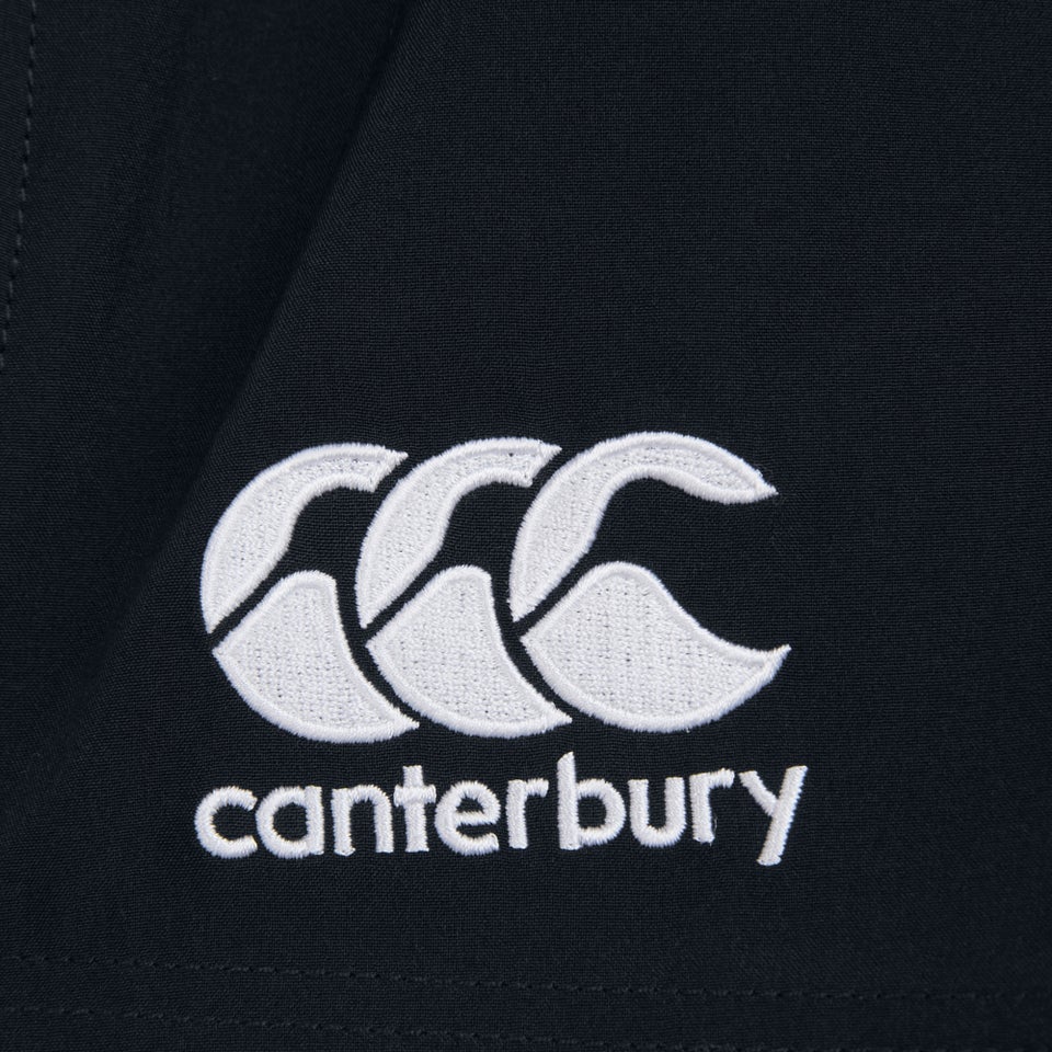 CANTERBURY IRE WOVEN SHORT JU BLACK/DARK PURPLE