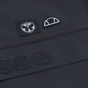 Unisex Tomorrowland X ellesse Windjacke Schwarz