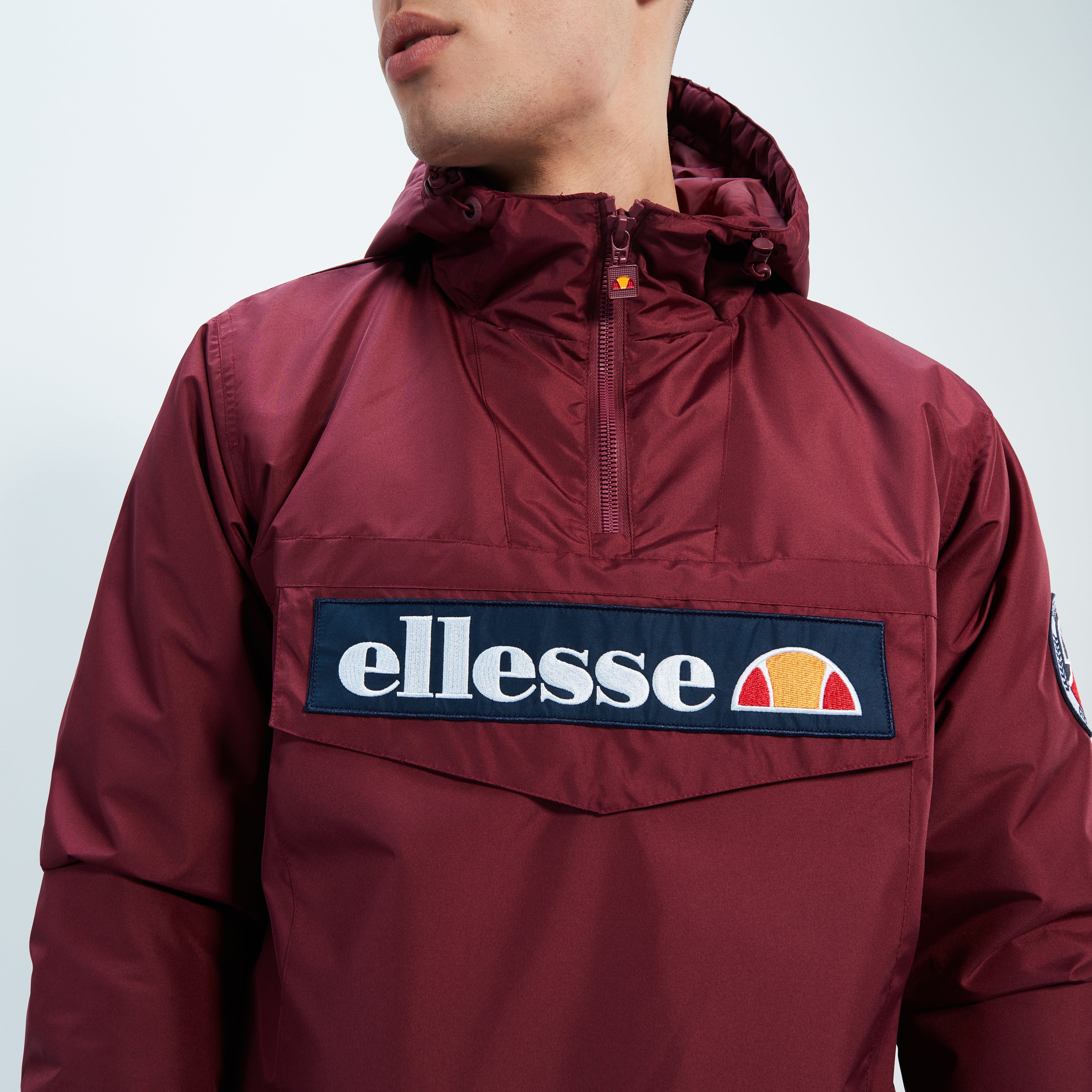 Ellesse フード付きレッドジャケット Men's Monterini OH Jacket Burgundy | ellesse UK