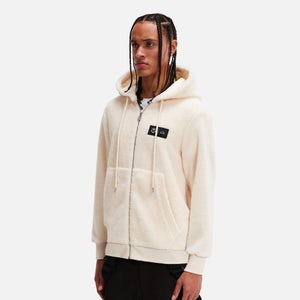 Tomorrowland X ellesse Fleece-Kapuzenpullover Creme