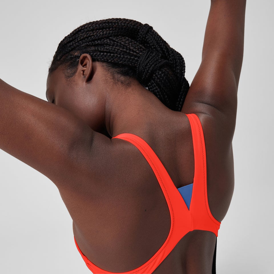 Monopièce à fermeture éclair pour femmes, noir/rouge