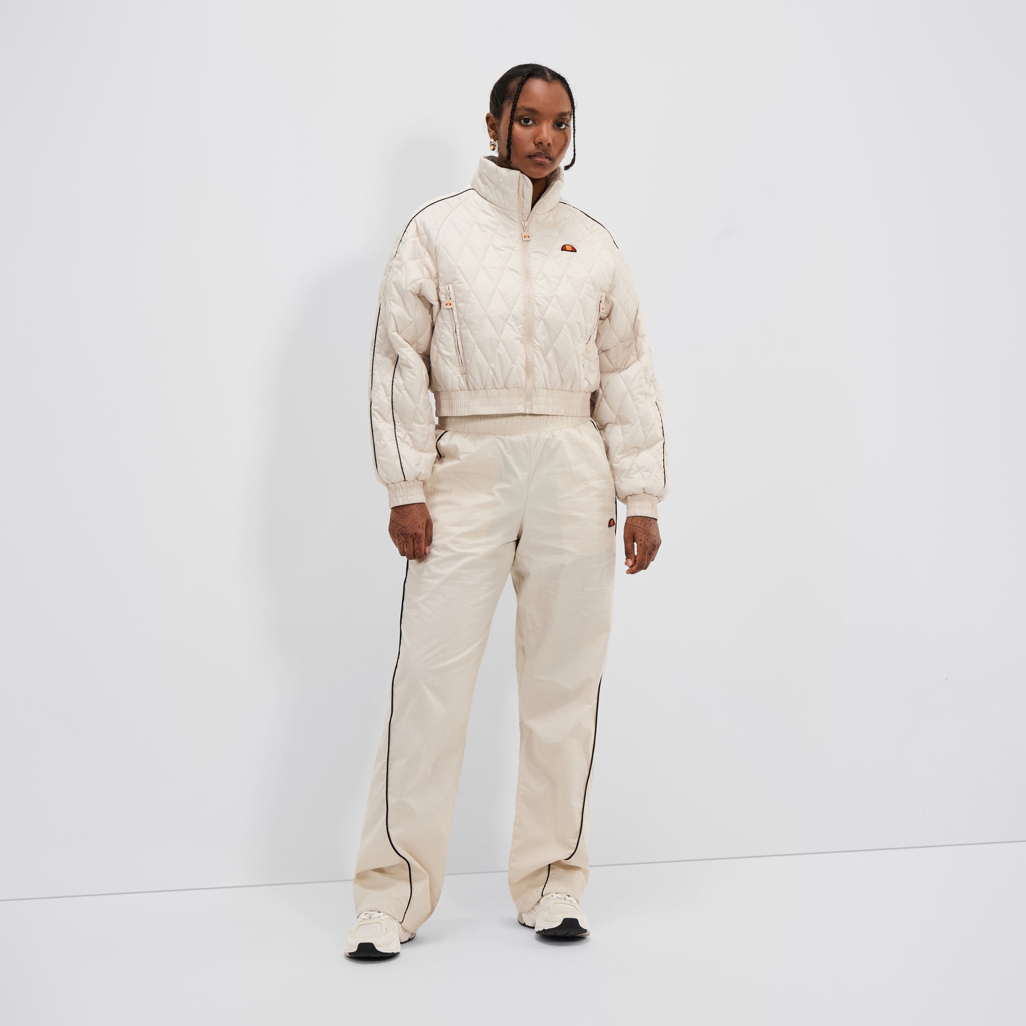 ellesse スキーウェア レディース上下 7-2ベージュ×ブラウンダウン80 Women's Vailski Jacket Beige | ellesse UK