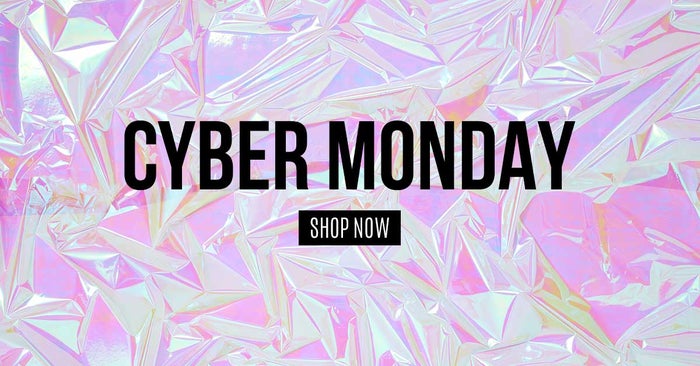 black cyber monday text on pink space foil background