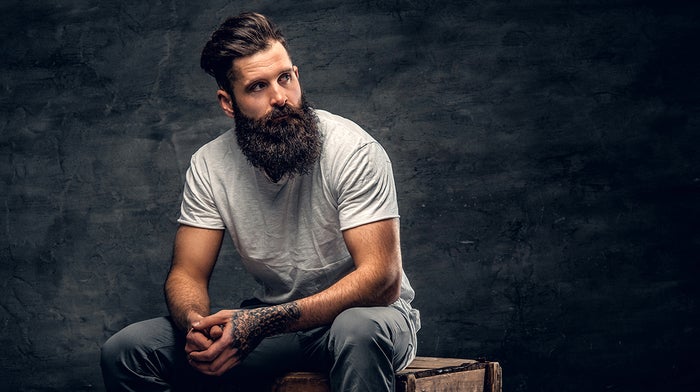 Man displaying long beard