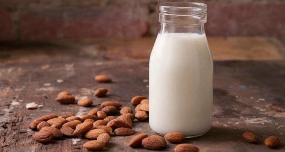 glass bottle of almond milk