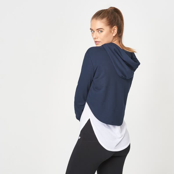 female model wearing cropped hoodie
