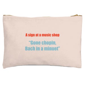 A Sign To A Music Shop Zipped Pouch