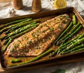 Baked Filet of Salmon with Asparagus and Caper-Enriched Lemon Sauce