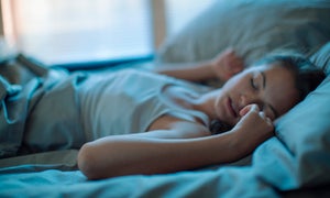 3 Dermatologists on the Benefits of Sleeping on Your Back