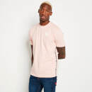 T-Shirt mit schmalem Zierstreifen seitlich – rosa