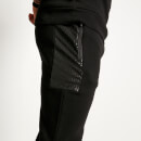 Pantalón de tejido mixto Regular Fit – Negro