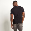 T-Shirt mit Zierstreifen – schwarz