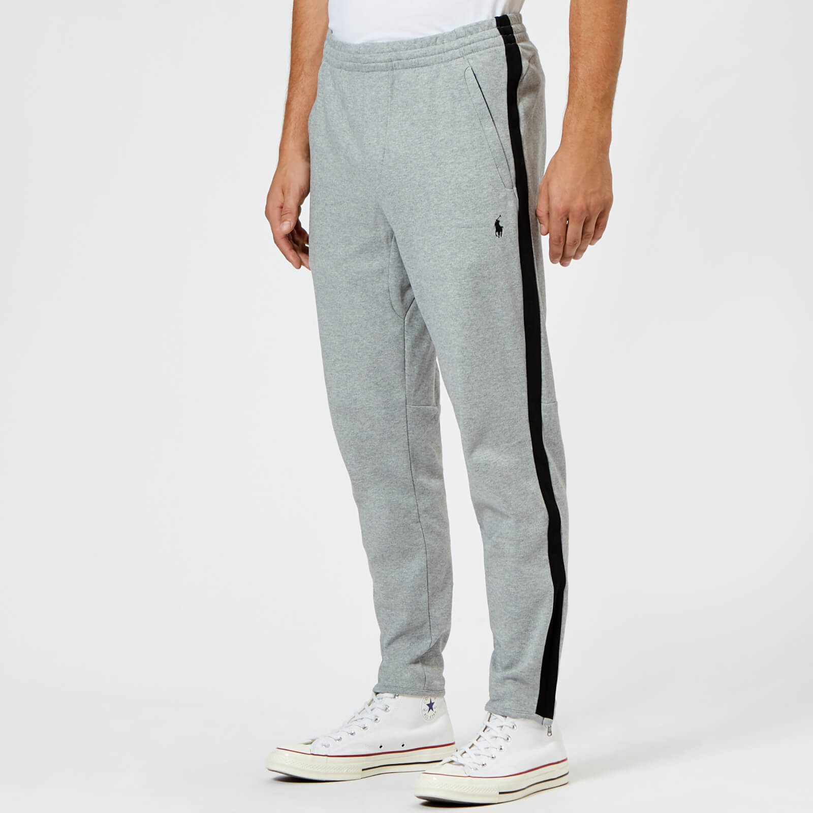 Track pants and polo on sale