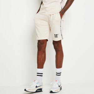 Sweatshorts mit schmalem Markenstreifen – leichtes Beige