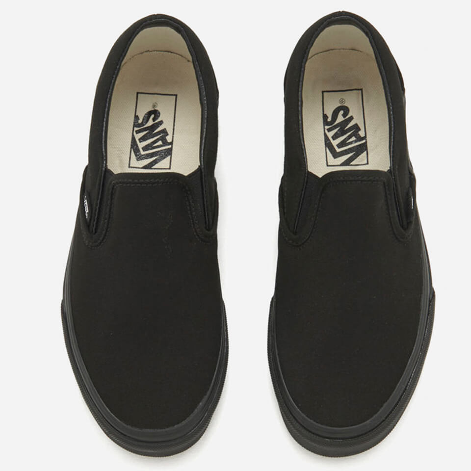 Vans Classic Slip-On Canvas Trainers - Black | Worldwide Delivery | Allsole