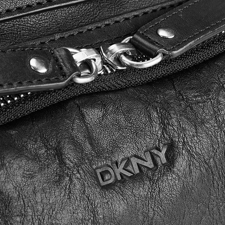 DKNY Men's Leather Backpack with Rivet Detail and Embossed Logo - Black