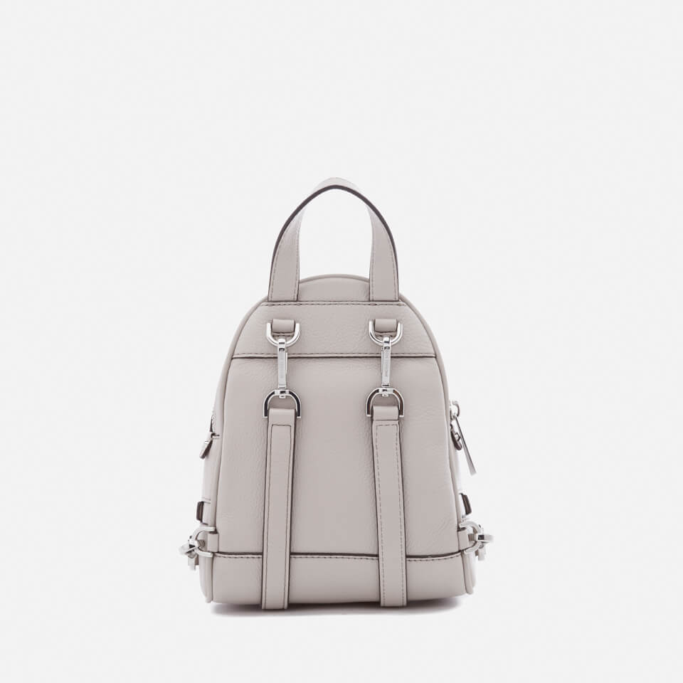 Michael Kors Jaycee Extra-small Logo Debossed Convertible Backpack in  Natural | Lyst