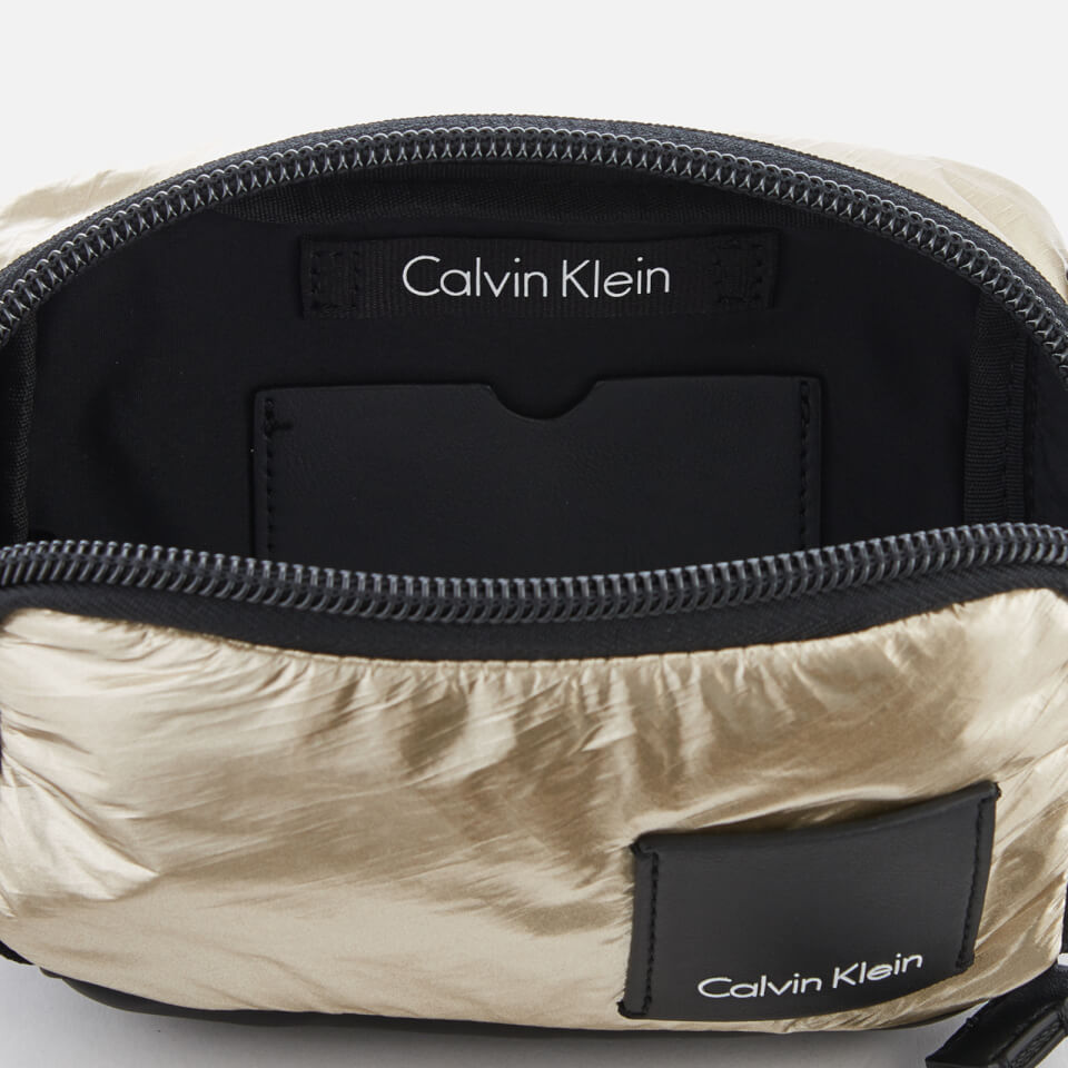 Calvin Klein Women's Fluid Small Cross Body Bag - Light Gold