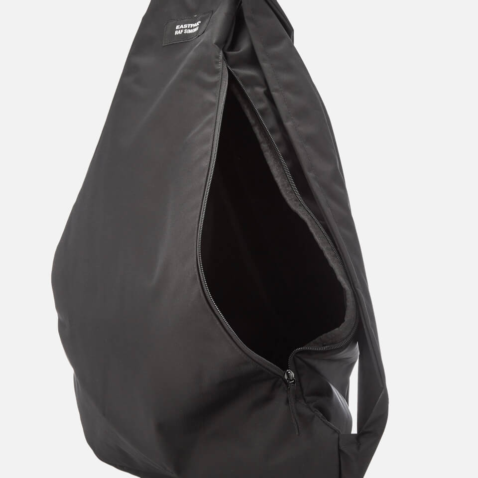 Eastpak x Raf Simons Sleek Sling Backpack — CONSUMED