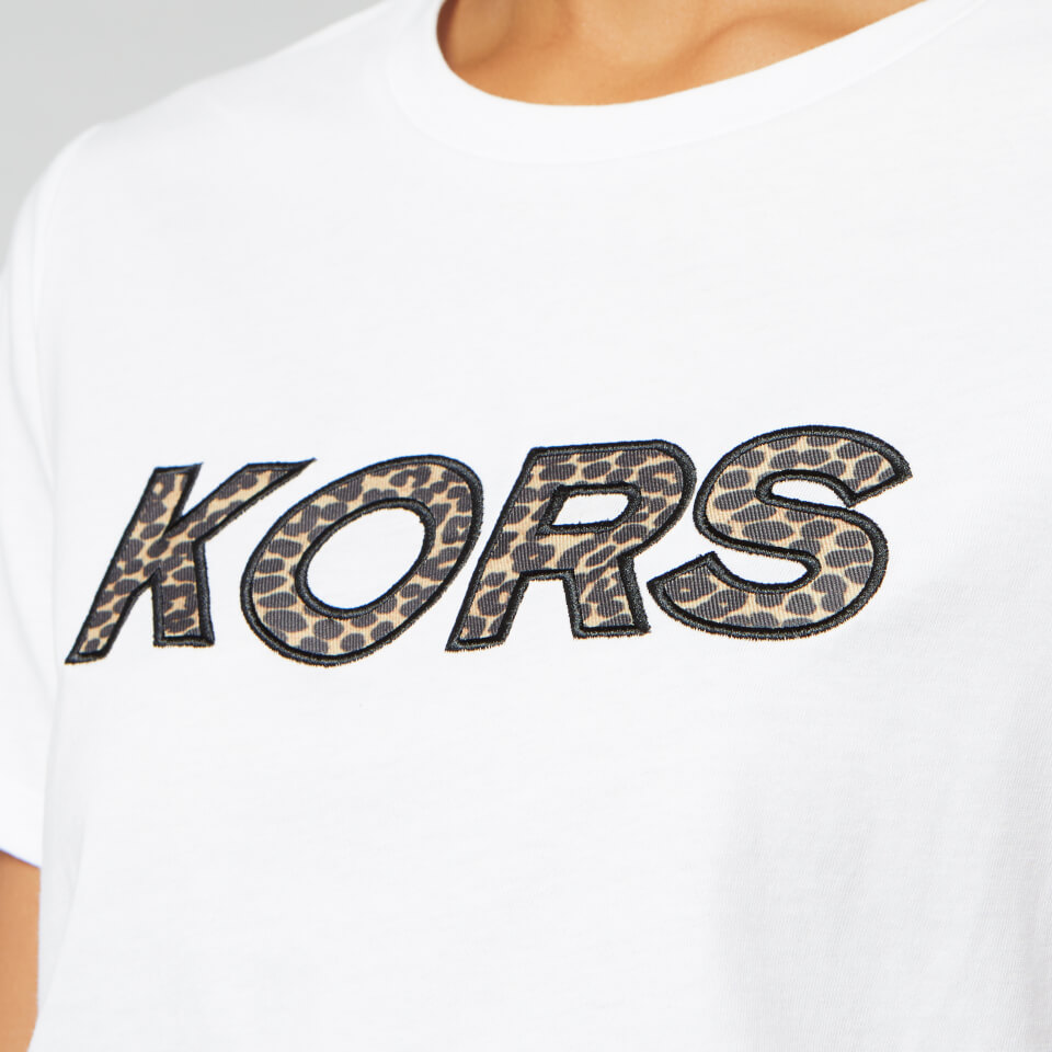 Tシャツ・カットソー Golden  T-SHIRT CON STAMPA LOGO Logo T-shirt with animal print and rhinestones brand GUESS