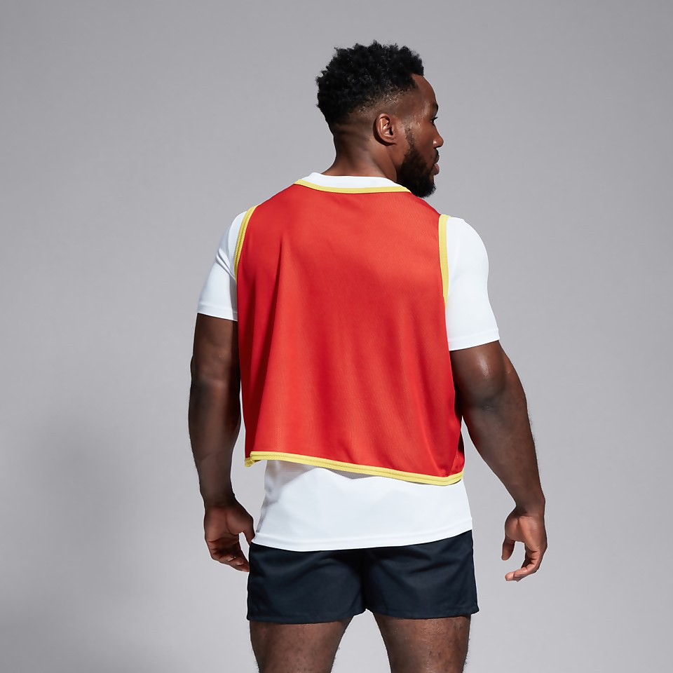 ADULT UNISEX REVERSIBLE BIB RED/YELLOW