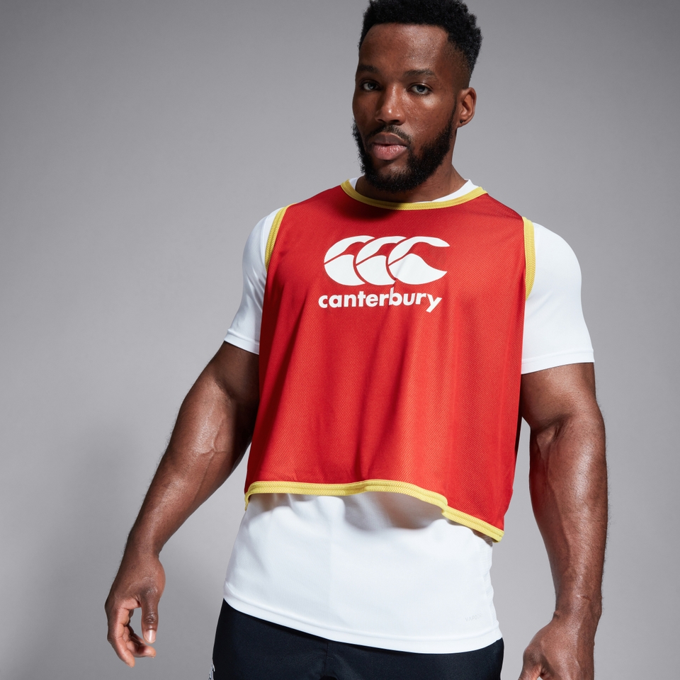 CANTERBURY REVERSIBLE BIB FLAG RED/YELLO