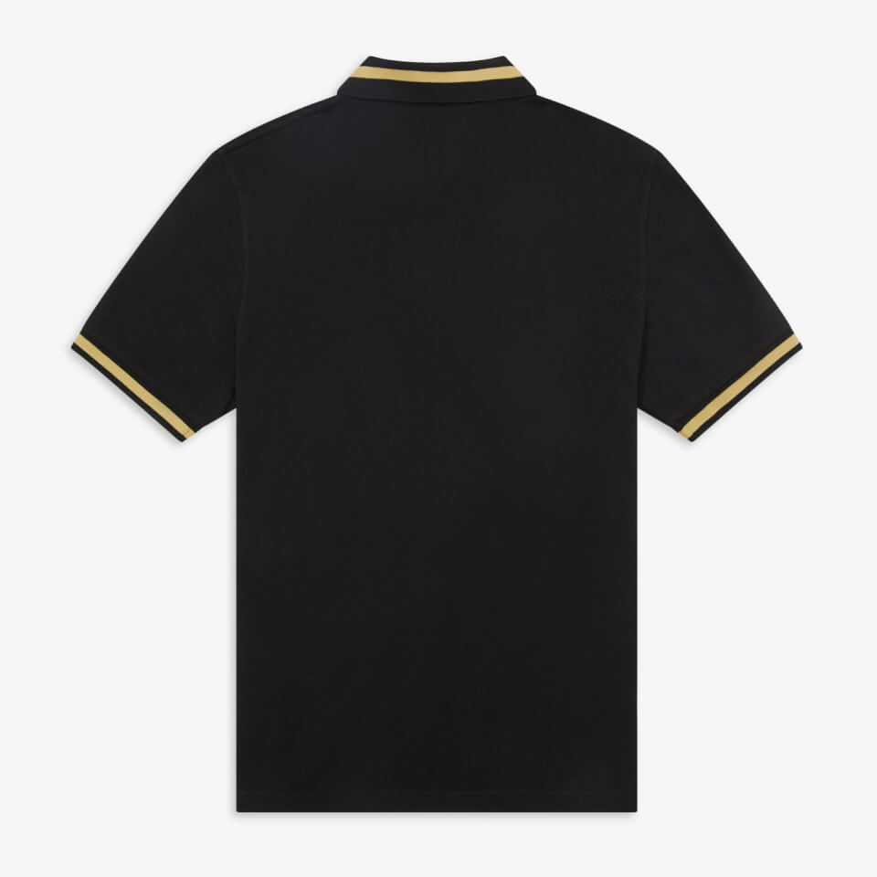 Black and champagne fred perry top