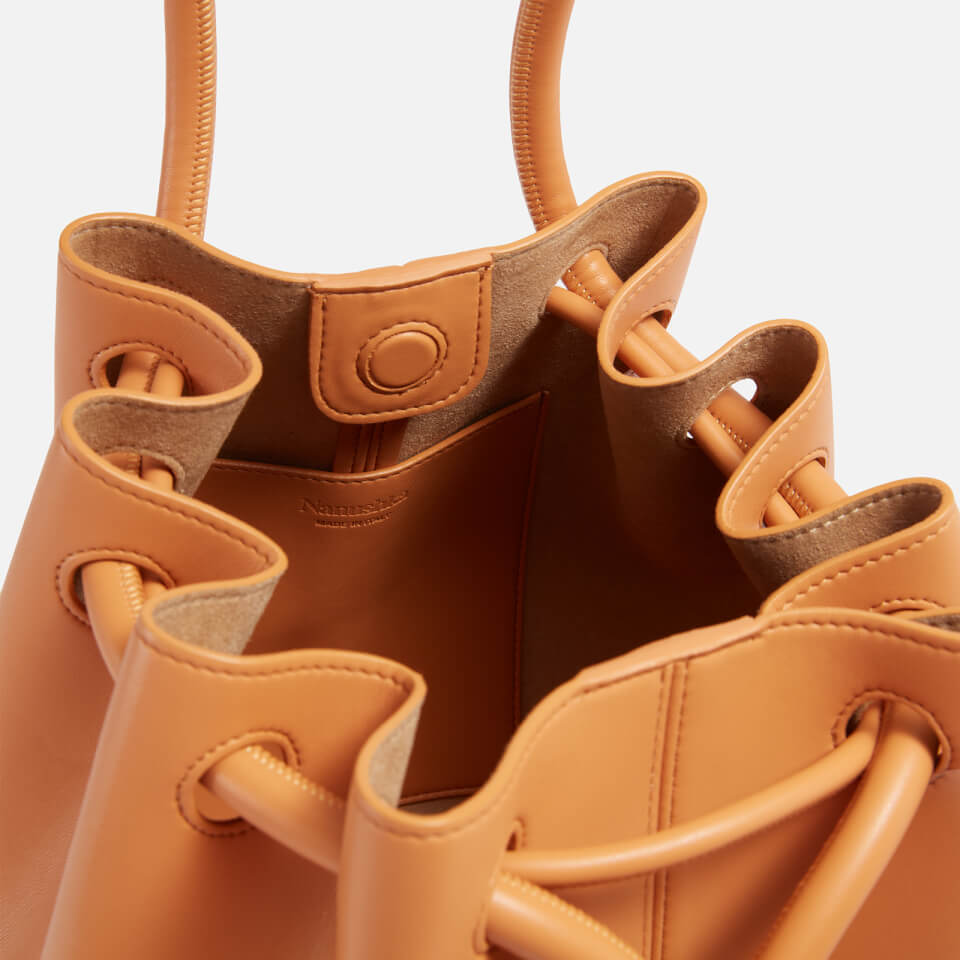 Nanushka Elongated Bucket Small Leather Bag | Coggles