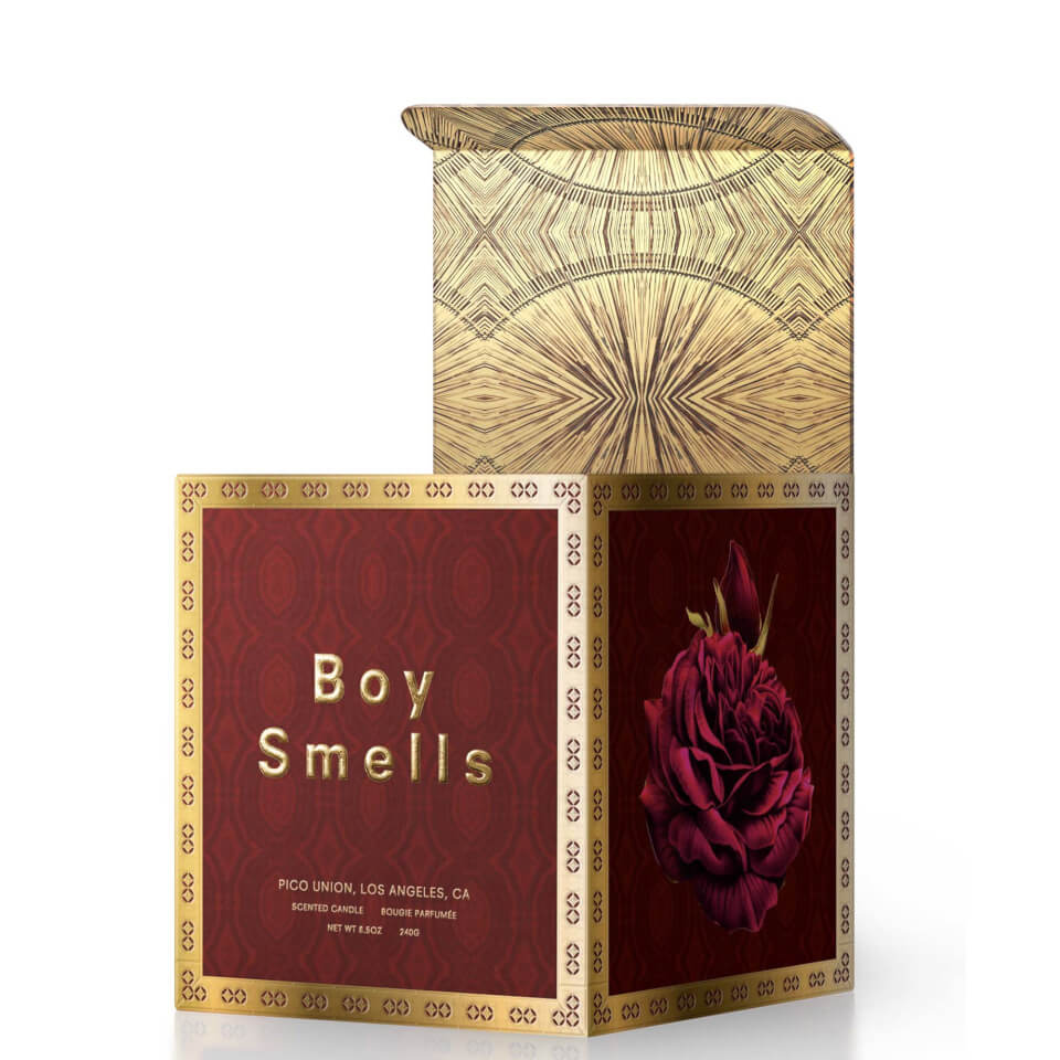 boy smells holiday broken rosary candle 8.5 oz