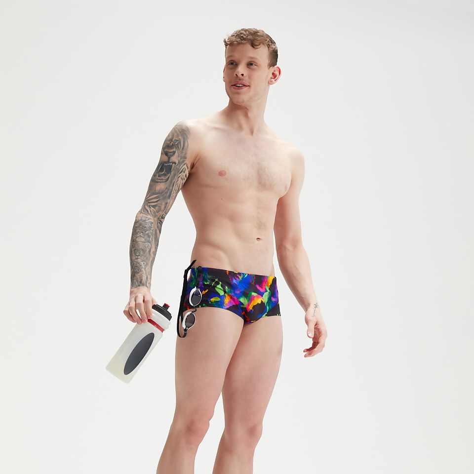 Slip de bain Homme Club Training Allover 13,5 cm noir/mangue