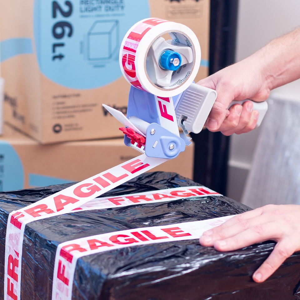 Wrap & Move Plastic Tape Dispenser Gun & 2 Rolls