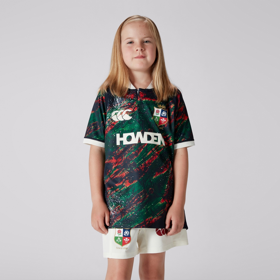 JUNIOR UNISEX BRITISH & IRISH LIONS WARM UP JERSEY NAVY/GEEN/RED
