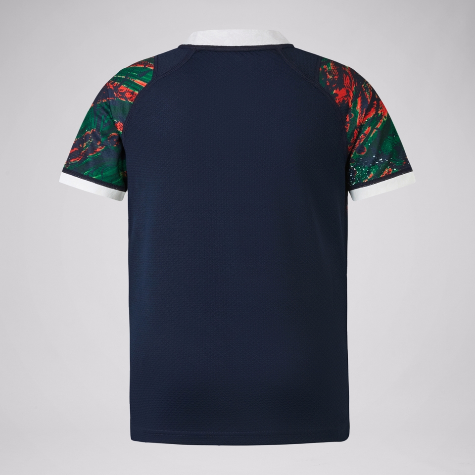 JUNIOR UNISEX BRITISH & IRISH LIONS WARM UP JERSEY NAVY/GEEN/RED