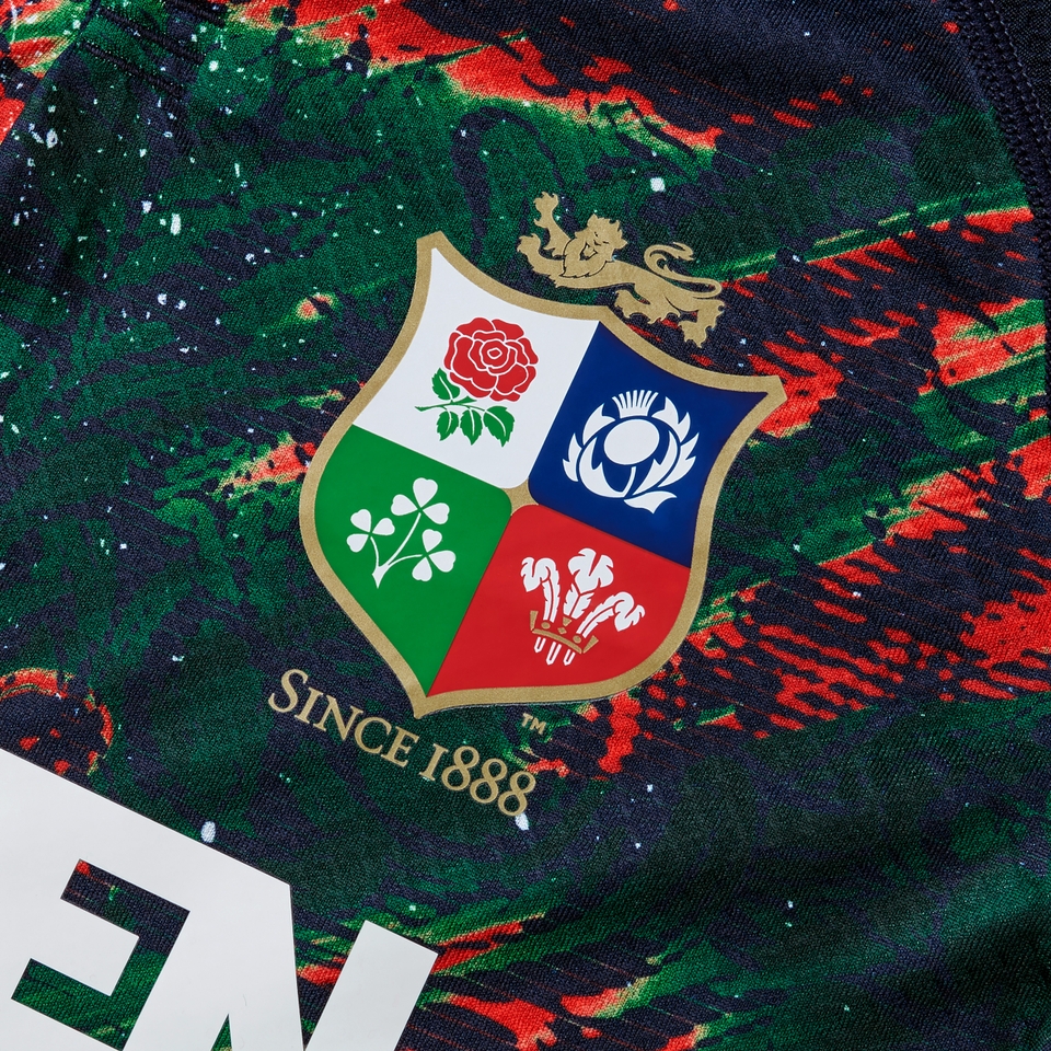 JUNIOR UNISEX BRITISH & IRISH LIONS WARM UP JERSEY NAVY/GEEN/RED