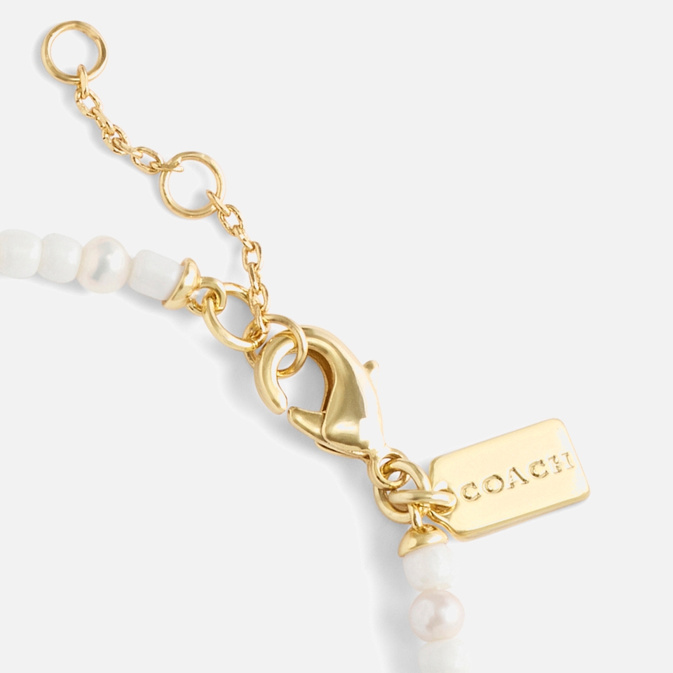 Coach Pearl Gold-Tone Charm Bracelet