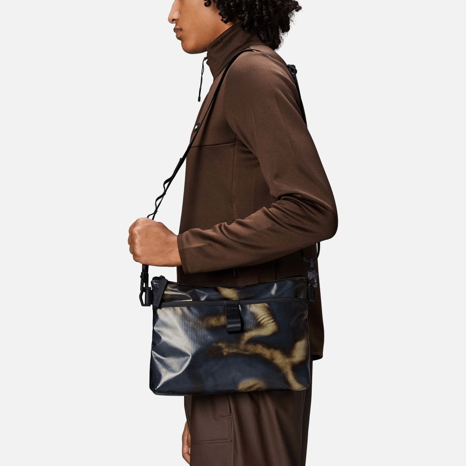 RAINS Sibu Coated Patent-Shell Musette Bag
