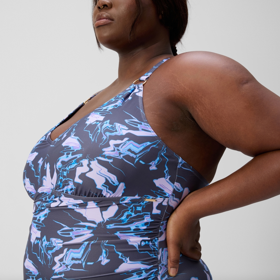 Damen Shaping-Badeanzug mit V-Ausschnitt und Print in Übergröße Violett/Grau