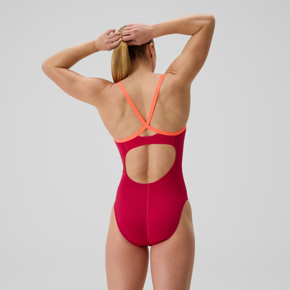 Monopièce d’entraînement rose/orange uni pour femmes Flyback 2.0