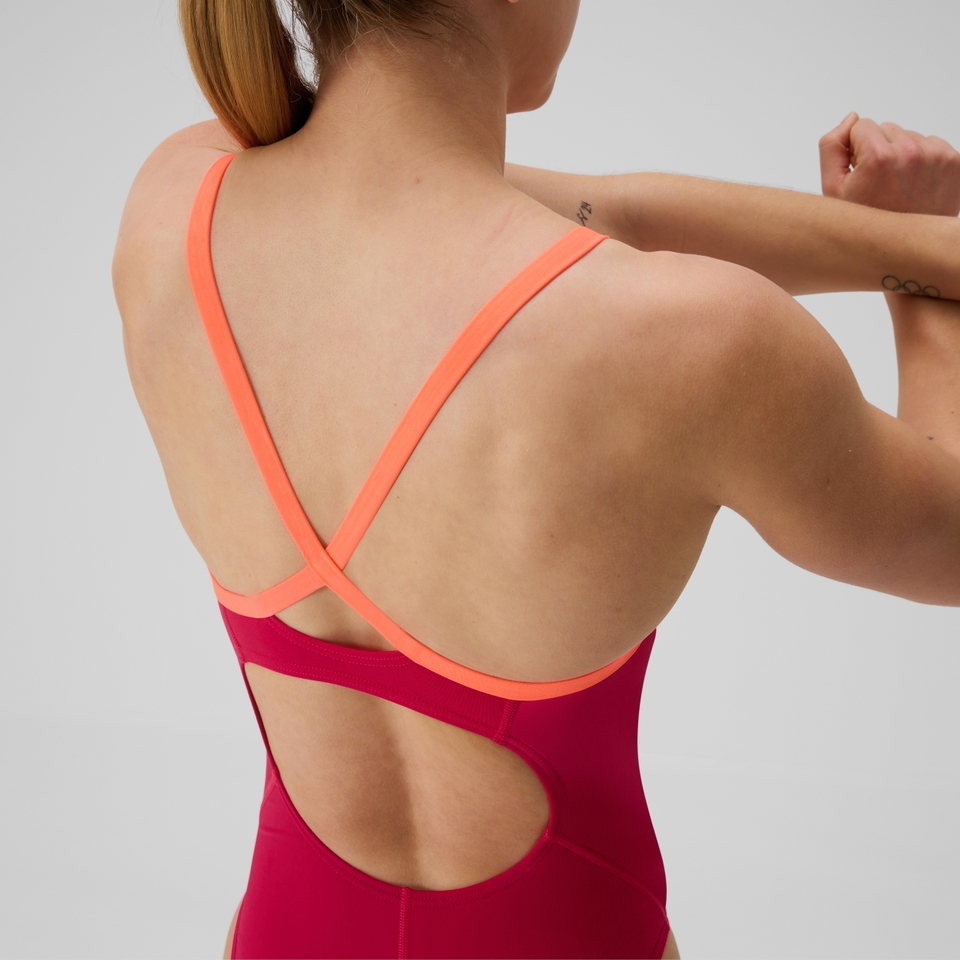 Monopièce d’entraînement rose/orange uni pour femmes Flyback 2.0