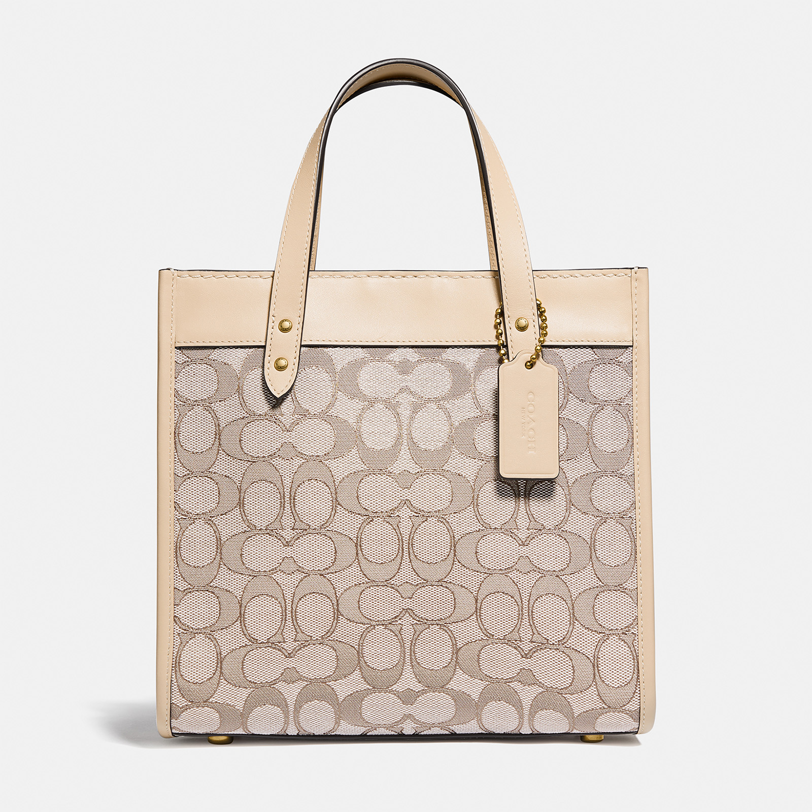 Selling Coach field tote 22 with heart print