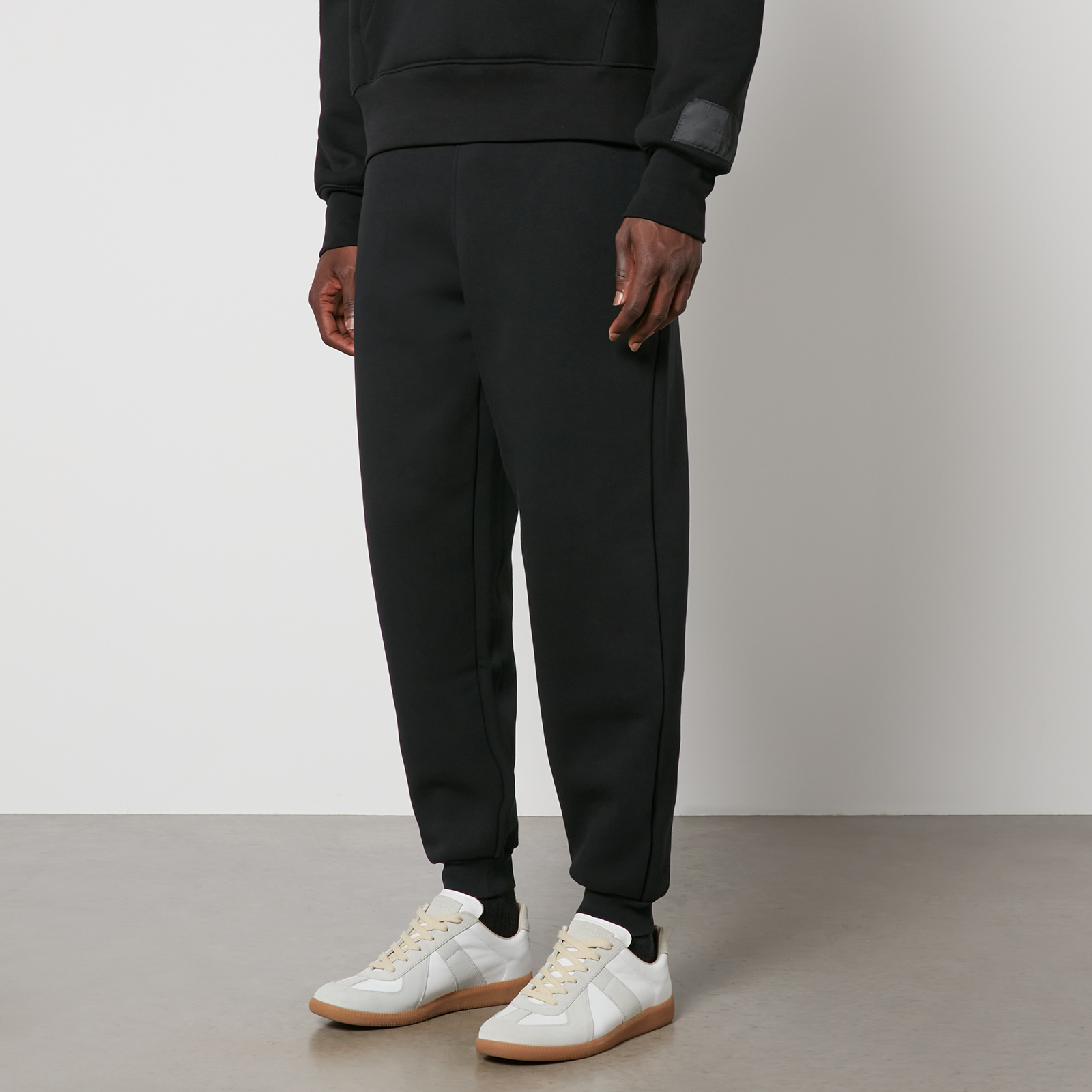 AMI Tonal Logo Cotton-Jersey Joggers - S | Coggles