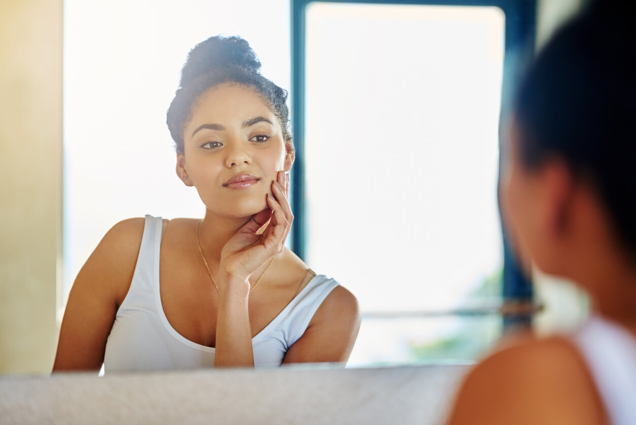 women looking at face