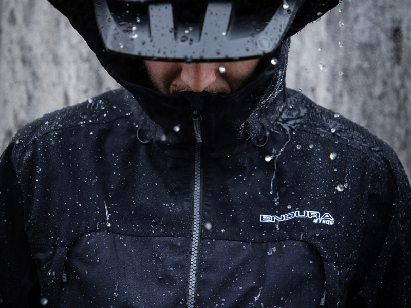 man in jacket in rain