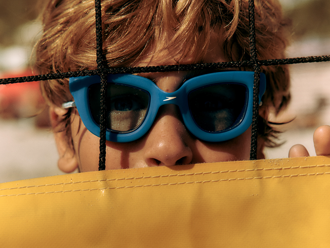 Shop junior goggles – boy wearing blue Sunny G goggles.