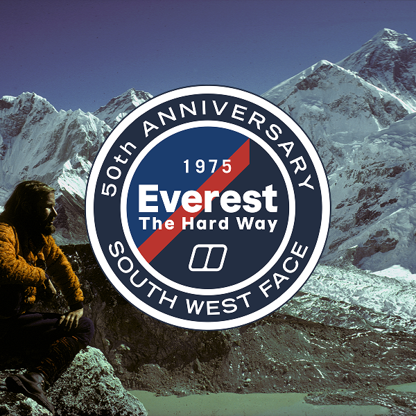There is a man perched overlooking snowy mountains. There is also a circular banner saying "50th anniversary south west france 1975 everest the hard way"
