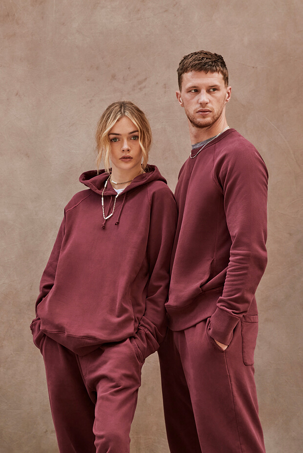 Man and Woman wearing David Gandy Wellwear burgundy sweat set