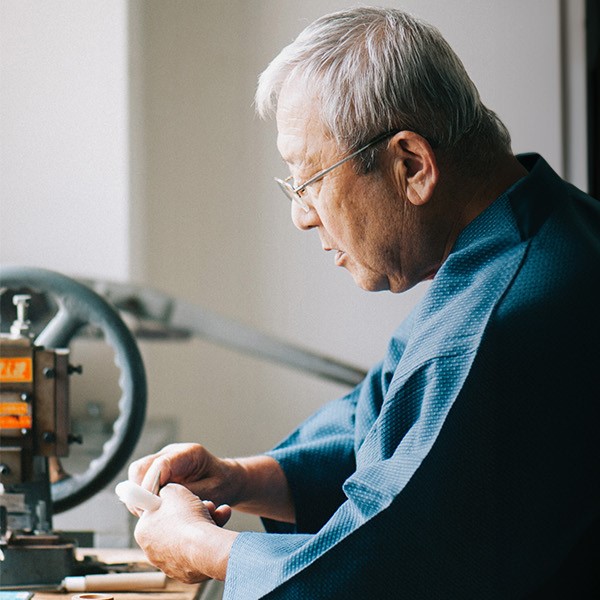 men making brushes