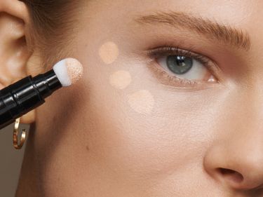 Image of model showing her make up for the code 8 face category 