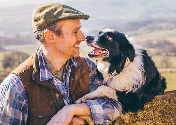 a dog and a man